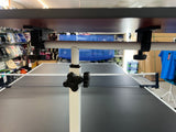 Umpires table adjustable height and versatile