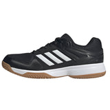 Black Adidas shoe with white stripes on a white background