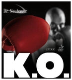 A boxing glove in red mesh dominates the foreground against a black background, with a blurred grayscale boxer visible behind it. Large white text reads 'K.